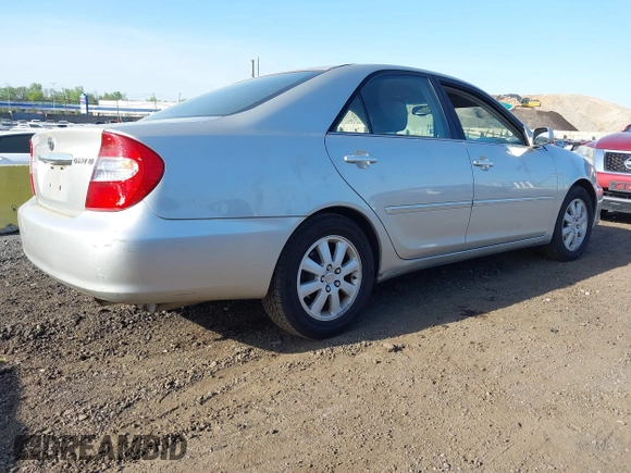 2003 Toyota Camry LE with VIN 4T1BE30K43U227357, listed as a IAAI auction lot 42144237 with 101,135 mi miles and . Bid and sale history available at DreamBid. Image 4.