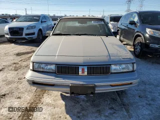 1993 Oldsmobile Cutlass Ciera S z VIN 1G3AG55N1P6333784, wystawiony jako Copart lot #44368645 z przebiegiem 82 129 mil mil oraz Czysty tytuł • Clean title. Historia ofert i sprzedaży dostępna na DreamBid. Obrazek 5.