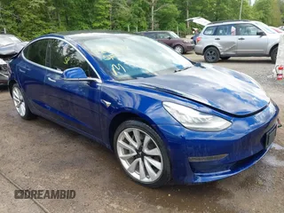 2019 Tesla Model 3 Mid Range z VIN 5YJ3E1EA8KF447914, wystawiony jako IAAI lot #42190382 z przebiegiem 121 649 mil mil oraz . Historia ofert i sprzedaży dostępna na DreamBid. Obrazek 1.