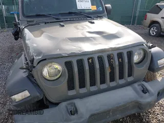 2019 Jeep Wrangler Unlimited Sport S with VIN 1C4HJXDG6KW578720, listed as a IAAI auction lot 42057153 with 65,719 mi miles and . Bid and sale history available at DreamBid. Image 17.