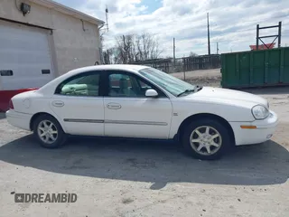 2000 Mercury Sable LS Premium z VIN 1MEFM55S6YA628641, wystawiony jako IAAI lot #41875950 z przebiegiem 35 453 mil mil oraz . Historia ofert i sprzedaży dostępna na DreamBid. Obrazek 13.