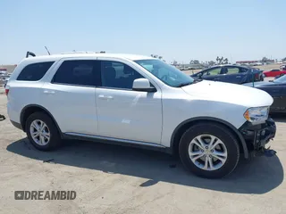 2013 Dodge Durango SXT with VIN 1C4RDHAG0DC669587, listed as a IAAI auction lot 42599143 with 126,748 mi miles and . Bid and sale history available at DreamBid. Image 14.