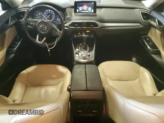 2019 Mazda CX-9 Touring with VIN JM3TCBCY3K0317900, listed as a Copart auction lot 64180945 with 63,721 mi miles and Salvage title. Bid and sale history available at DreamBid. Image 8.