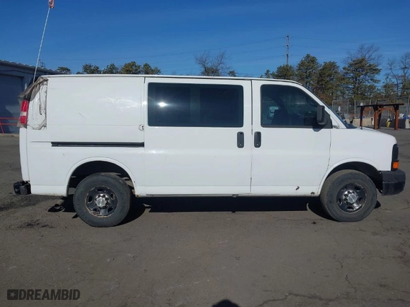 2012 Chevrolet Express Cargo Van with VIN 1GCWGFCA1C1156995, listed as a IAAI auction lot 36881076 with 212,274 mi miles. Bid and sale history available at carsss.com. Image 13.