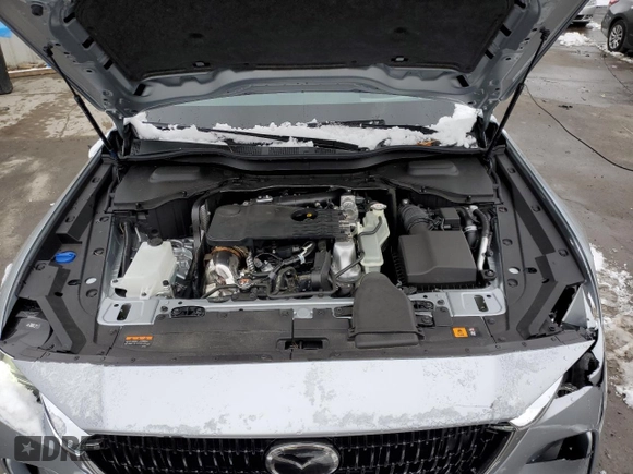 2024 Mazda CX-90 S Premium z VIN JM3KKDHC7R1147911, wystawiony jako Copart lot #83414044 z przebiegiem 11 220 mil mil oraz Szkoda całkowita • Salvage title. Historia ofert i sprzedaży dostępna na DreamBid. Obrazek 13.