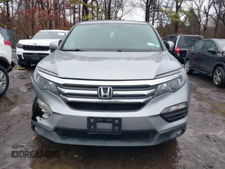 2017 Honda Pilot EX-L with VIN 5FNYF6H51HB069068, listed as a IAAI auction lot 41567728 with 100,618 mi miles and . Bid and sale history available at DreamBid. Image 12.