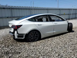 2020 Tesla Model 3 Standard Range Plus with VIN 5YJ3E1EA3LF612365, listed as a Copart auction lot 54421205 with Not Provided miles and Clean Title. Bid and sale history available at DreamBid. Image 3.