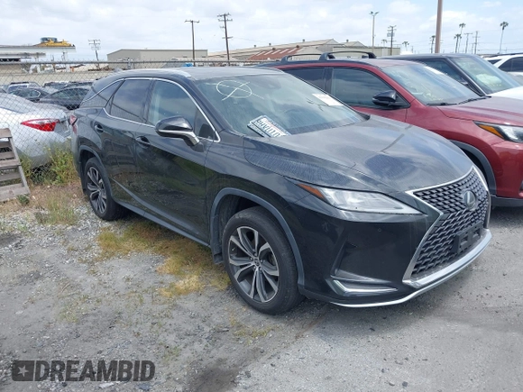 2020 Lexus RX with VIN JTJHZKEA3L2016365, listed as a IAAI auction lot 41615430 with 33,853 mi miles. Bid and sale history available at carsss.com. Image 1.