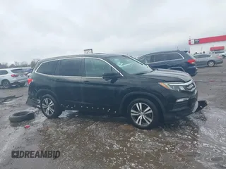 2016 Honda Pilot EX-L with VIN 5FNYF5H56GB031831, listed as a IAAI auction lot 41111342 with 244,197 mi miles and . Bid and sale history available at DreamBid. Image 13.