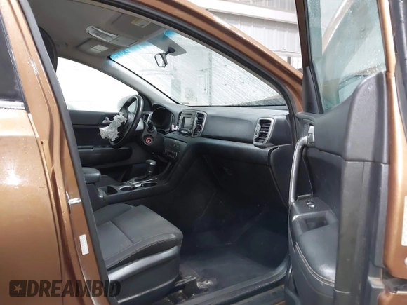 2018 Kia Sportage LX with VIN KNDPMCAC9J7403108, listed as a IAAI auction lot 41946497 with 123,023 mi miles. Bid and sale history available at carsss.com. Image 5.