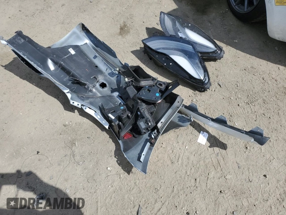 2022 Tesla Model 3 Long Range z VIN 5YJ3E1EB3NF174314, wystawiony jako Copart lot #52713325 z przebiegiem 27 646 mil mil oraz Szkoda całkowita • Salvage title. Historia ofert i sprzedaży dostępna na DreamBid. Obrazek 14.