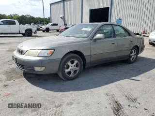 1998 Lexus ES 300 с VIN JT8BF28G6W5046785, выставлен на аукционе Copart как лот 55593105 с пробегом 228 132 миль миль и Списание • Salvage title. История ставок и продаж доступна на DreamBid. Изображение 1.