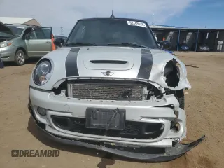 2015 MINI Convertible S z VIN WMWZP3C52FT298857, wystawiony jako Copart lot #58149145 z przebiegiem 52 777 mil mil oraz Szkoda całkowita • Salvage title. Historia ofert i sprzedaży dostępna na DreamBid. Obrazek 5.