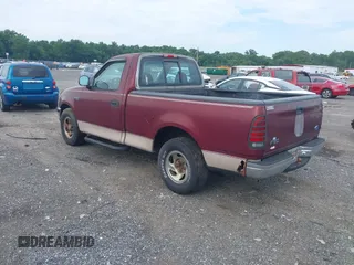 1997 Ford F-150 with VIN 1FTDF1720VNB30982, listed as a IAAI auction lot 42764577 with 296,424 mi miles and . Bid and sale history available at DreamBid. Image 3.