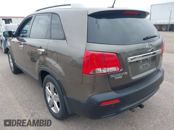2012 Kia Sorento EX with VIN 5XYKUCA6XCG294104, listed as a IAAI auction lot 42413363 with 57,527 mi miles and . Bid and sale history available at DreamBid. Image 3.