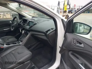 2016 Ford Escape SE with VIN 1FMCU0GX0GUA95789, listed as a IAAI auction lot 41829818 with 84,431 mi miles. Bid and sale history available at carsss.com. Image 5.
