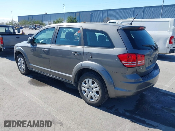 2013 Dodge Journey SE with VIN 3C4PDCAB7DT730744, listed as a IAAI auction lot 41900114 with 186,086 mi miles and . Bid and sale history available at DreamBid. Image 3.