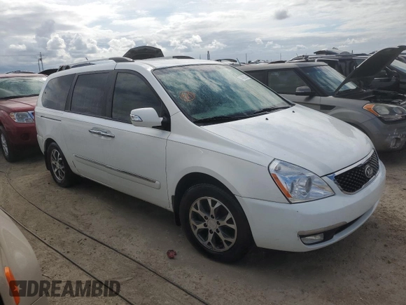 2014 Kia Sedona EX with VIN KNDMH4C70E6568487, listed as a Copart auction lot 74682134 with 69,977 mi miles and Salvage Title. Bid and sale history available at carsss.com. Image 4.