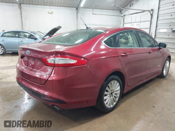 2013 Ford Fusion SE Hybrid with VIN 3FA6P0LU9DR150396, listed as a IAAI auction lot 42080329 with 195,665 mi miles. Bid and sale history available at carsss.com. Image 4.