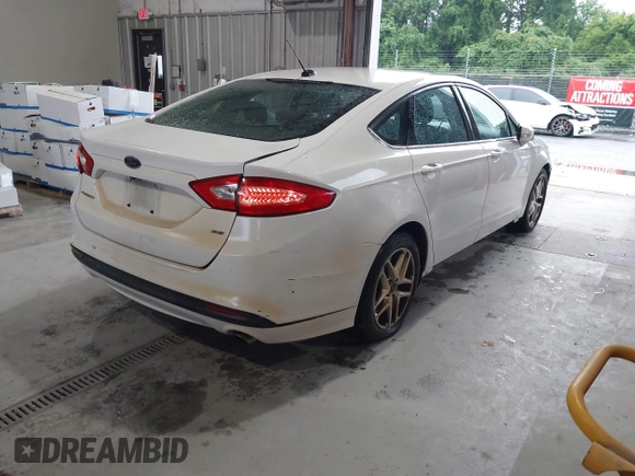 2016 Ford Fusion SE with VIN 1FA6P0H77G5114717, listed as a IAAI auction lot 42166800 with 186,610 mi miles and . Bid and sale history available at DreamBid. Image 4.
