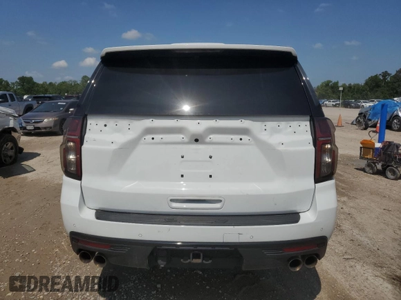2023 Chevrolet Suburban with VIN 1GNSKDKL5PR286474, listed as a Copart auction lot 55678915 with 96,049 mi miles and Salvage title. Bid and sale history available at DreamBid. Image 6.