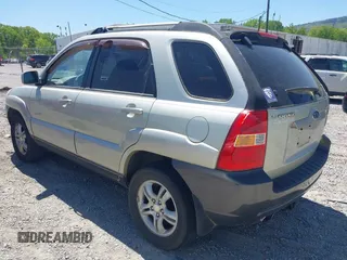 2005 Kia Sportage LX with VIN KNDJF723457060171, listed as a IAAI auction lot 42059269 with 189,461 mi miles and . Bid and sale history available at carsss.com. Image 3.