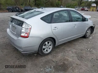 2009 Toyota Prius z VIN JTDKB20U497879346, wystawiony jako IAAI lot #41927970 z przebiegiem 291 906 mil mil oraz . Historia ofert i sprzedaży dostępna na DreamBid. Obrazek 4.