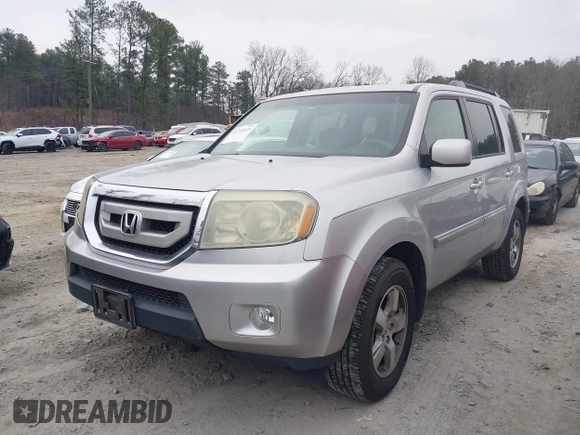 2010 Honda Pilot EX with VIN 5FNYF3H41AB009318, listed as a IAAI auction lot 41759335 with 231,174 mi miles and . Bid and sale history available at carsss.com. Image 2.