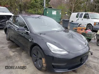 2019 Tesla Model 3 Mid Range with VIN 5YJ3E1EA3KF313425, listed as a IAAI auction lot 41806388 with 110,767 mi miles. Bid and sale history available at carsss.com. Image 1.