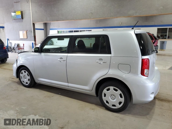 2012 Scion xB with VIN JTLZE4FE4CJ017485, listed as a Copart auction lot 53947535 with 113,979 mi miles and Salvage Title. Bid and sale history available at DreamBid. Image 2.