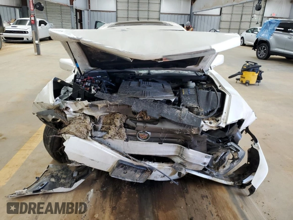 2006 Cadillac CTS z VIN 1G6DP577660112875, wystawiony jako Copart lot #87670565 z przebiegiem Nie podano mil oraz Szkoda całkowita • Salvage title. Historia ofert i sprzedaży dostępna na DreamBid. Obrazek 5.