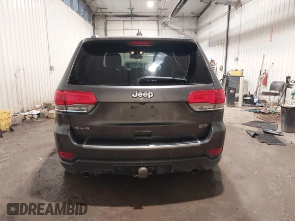 2015 Jeep Grand Cherokee Overland z VIN 1C4RJFCG1FC663469, wystawiony jako IAAI lot #41666113 z przebiegiem 140 159 mil mil oraz . Historia ofert i sprzedaży dostępna na DreamBid. Obrazek 16.