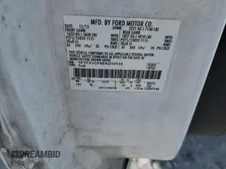 2014 Ford F-150 XL with VIN 1FTFX1CF5EKD13133, listed as a Copart auction lot 56876035 with 128,636 mi miles and Salvage title. Bid and sale history available at DreamBid. Image 12.