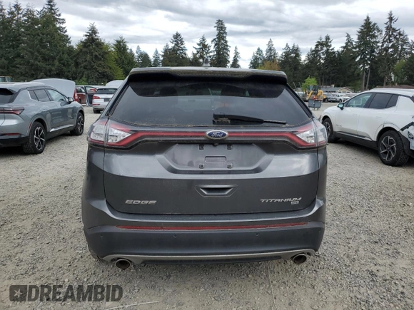 2015 Ford Edge Titanium z VIN 2FMTK4K84FBB09582, wystawiony jako Copart lot #55801915 z przebiegiem 72 533 mil mil oraz Szkoda całkowita • Salvage title. Historia ofert i sprzedaży dostępna na DreamBid. Obrazek 6.