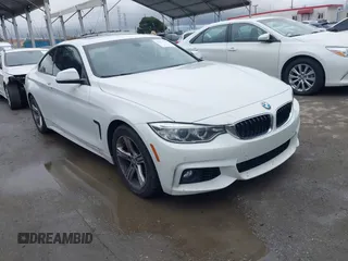 2015 BMW 4 Series 428i with VIN WBA3N7C58FK222925, listed as a IAAI auction lot 41776858 with 106,946 mi miles and . Bid and sale history available at carsss.com. Image 1.