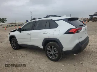 2024 Toyota RAV4 Hybrid XLE Premium with VIN JTMB6RFV6RJ054408, listed as a Copart auction lot 52120745 with 2,961 mi miles and Salvage Title. Bid and sale history available at DreamBid. Image 2.