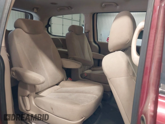 2010 Kia Sedona LX with VIN KNDMG4C35A6343380, listed as a IAAI auction lot 42042669 with 119,648 mi miles. Bid and sale history available at carsss.com. Image 8.