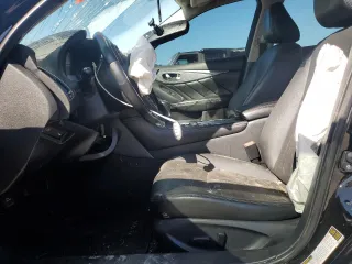 2015 Infiniti Q50 Premium with VIN JN1BV7AP4FM345938, listed as a Copart auction lot 77319234 with 134,731 mi miles and Salvage Title. Bid and sale history available at carsss.com. Image 7.