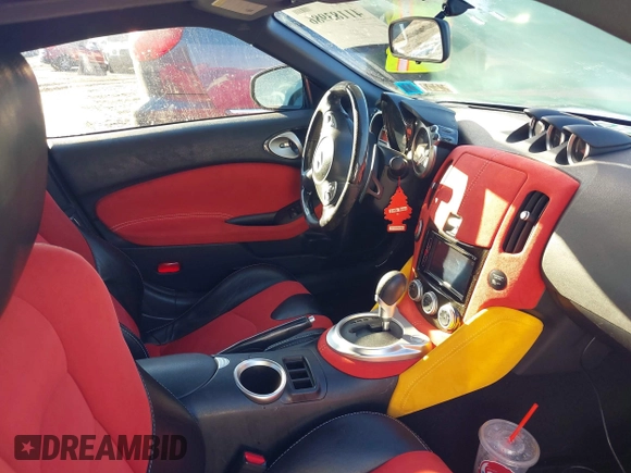 2009 Nissan 370Z Touring with VIN JN1AZ44E19M401881, listed as a IAAI auction lot 41183986 with 127,000 mi miles and . Bid and sale history available at DreamBid. Image 5.