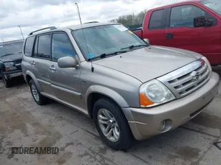 2005 Suzuki XL-7 LX with VIN JS3TX92V954108706, listed as a IAAI auction lot 42040623 with 217,837 mi miles. Bid and sale history available at carsss.com. Image 1.
