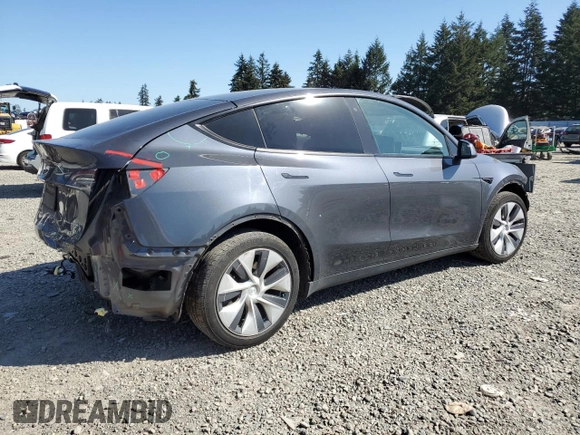 2020 Tesla Model Y Long Range with VIN 5YJYGDEEXLF017789, listed as a Copart auction lot 52705185 with 49,470 mi miles and Salvage Title. Bid and sale history available at DreamBid. Image 3.
