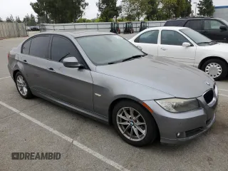 2010 BMW 3 Series 328i with VIN WBAPH5G51ANM36203, listed as a Copart auction lot 57349235 with 183,491 mi miles and Salvage title. Bid and sale history available at DreamBid. Image 4.