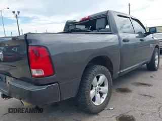 2014 Ram 1500 Express with VIN 1C6RR6KTXES272212, listed as a IAAI auction lot 42452271 with 140,854 mi miles and . Bid and sale history available at DreamBid. Image 4.
