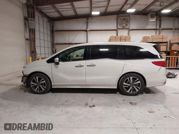 2018 Honda Odyssey Elite with VIN 5FNRL6H94JB034739, listed as a IAAI auction lot 41242506 with 96,982 mi miles and . Bid and sale history available at DreamBid. Image 15.
