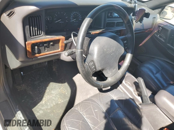 1997 Jeep Grand Cherokee Limited with VIN 1J4GZ78Y4VC567237, listed as a Copart auction lot 49059105 with 177,478 mi miles and Salvage Title. Bid and sale history available at carsss.com. Image 8.