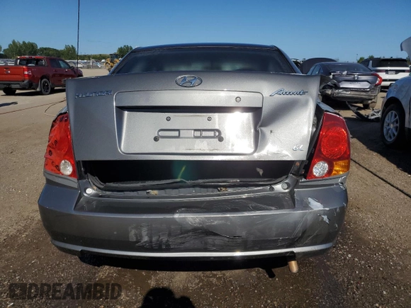 2005 Hyundai Accent GLS with VIN KMHCG45C05U605716, listed as a Copart auction lot 69445324 with 158,082 mi miles and Clean Title. Bid and sale history available at carsss.com. Image 6.