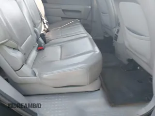 2013 Honda Pilot EX-L with VIN 5FNYF4H65DB060543, listed as a IAAI auction lot 42380911 with 330,452 mi miles and . Bid and sale history available at DreamBid. Image 8.