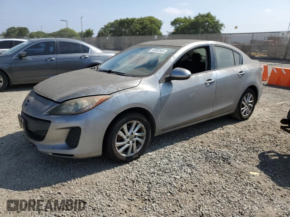 2012 Mazda 3 i Touring with VIN JM1BL1V86C1557191, listed as a Copart auction lot 63002985 with 218,863 mi miles and Clean title. Bid and sale history available at DreamBid. Image 1.