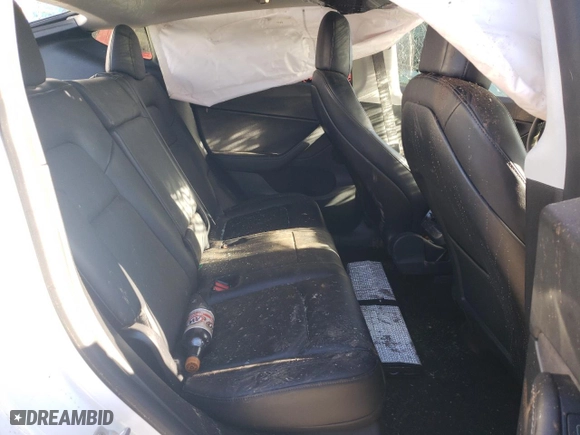 2021 Tesla Model Y Long Range with VIN 5YJYGDEE4MF196641, listed as a Copart auction lot 49305755 with 54,346 mi miles and Salvage Title. Bid and sale history available at carsss.com. Image 10.
