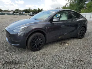 2024 Tesla Model Y Long Range z VIN 7SAYGDEE4RA285620, wystawiony jako Copart lot #57883015 z przebiegiem 18 841 mil mil oraz Szkoda całkowita • Salvage title. Historia ofert i sprzedaży dostępna na DreamBid. Obrazek 1.